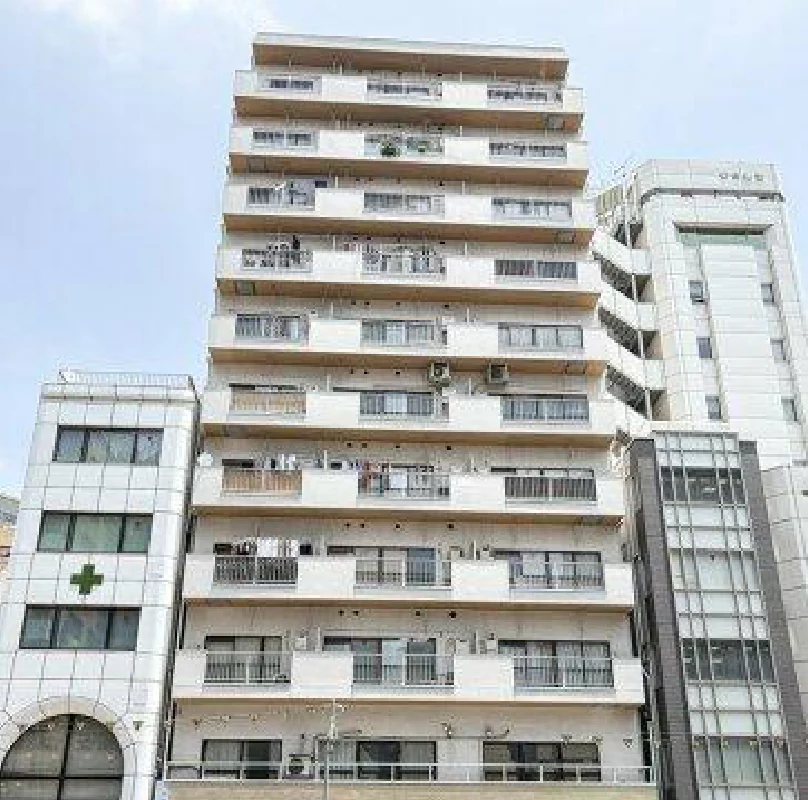 The eleven-storey building with balconies across its street elevation